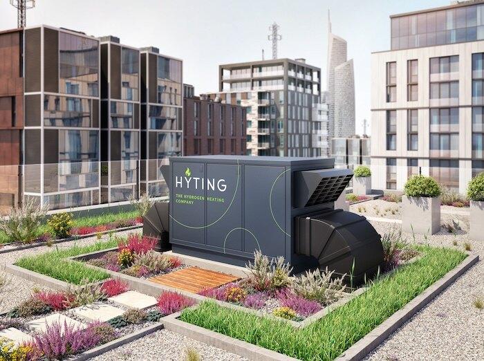 Een waterstof-warmte-unit opgesteld op een daktuin tussen stadsgebouwen.